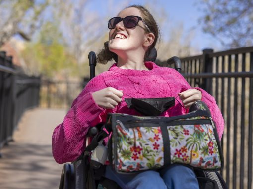 A woman in a wheelchair with a disability exploring